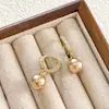 Pendientes de Diseño de Nicho de Lujo Ligero Estilo Francés Pendientes Dulces y Frescos Moda Simple Puños de Oreja de Perla de Gama Alta