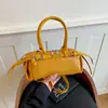 Bolso de mano para mujer transfronterizo colección 2026: un bolso de hombro elegante y versátil con un diseño retro, perfecto para el uso diario informal