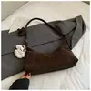 Moda Nueva 2026 Estilo Coreano Retro Color Sólido Versátil Bolso de Hombro Bolso Casual para Mujer para el Trabajo y los Viajes Bolso Cruzado