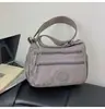 Bolso multicapa casual para mujer, estilo nuevo, ligero, de un solo hombro, bandolera, urbano, simple, para madres de mediana edad y mayores, bolsa pequeña de tela, transfronterizo
