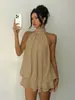 Vestido de dos piezas de estilo europeo y americano, nuevo, de color liso, para vacaciones, corte ajustado, sexy, sin espalda, cuello halter, entallado a la cintura, con falda corta abullonada, para mujer