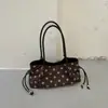 Bolso de mano de lujo ligero estilo coreano al por mayor para mujer, nuevo bolso de hombro elegante de lunares para otoño 2026, bolso de axila para ir al trabajo