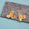 Pendientes de Aleación de Cobre con Diseño de Camelia en Dorado y Plateado, Diseño de Nicho de Lujo Ligero, Pendientes de Estilo de Moda de Alta Gama