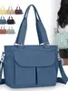 Bolso de mujer tendencia transfronteriza, bolso de hombro para mamá, nuevo modelo 2026, tela de nailon ligera, bolso de tela de color liso, bolso de mano cruzado