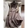 Conjunto de tres piezas de ropa de trabajo de manga larga + chaleco de trabajo con cuello alto + falda, venta al por mayor N3DTZ8082