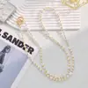 Funda de Teléfono Cruzada de Perlas Simple con Correa de Mano, Correa para el Cuello y Cadena, Modelo Trendy Creativo Anti-Caídas para Mujer