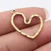 Colgante de Corazón Hueco Martillado Multicolor de 26x21 mm 1.5 g Accesorios de Exportación Al por Mayor