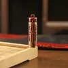 Llavero de tarro con mantra Lingyagn de aceite rojo, tarro hueco de latón puro con sutra, se puede abrir para guardar sutras, colgante de cuerda trenzada hecho a mano