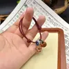 Pulseira cesta de pêssego para mulheres, pulseira tecida de nicho com pedra de pêssego, fio vermelho para proteção no ano do zodíaco, pulseira de madeira de pêssego para proteção adulta