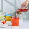 Nuevo vaso de agua color macarrón con asa portátil, vaso de vidrio, a prueba de fugas, alto valor estético, elegante vaso con pajilla