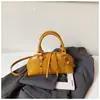 Bolsa feminina Shuai Mi Jia de cor sólida simples, nova bolsa feminina da moda, bolsa de ombro e transversal estilosa e única de nicho