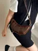 Bolso de nicho transfronterizo para mujer 2026, bolso versátil de hombro y cruzado, bolso de cuerno moderno y súper popular, bolso nuevo y moderno ligero