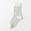 Calcetines de algodón de Xinjiang, calcetines de media pantorrilla para mujer, nuevos estilos de otoño, algodón puro, calcetines de moda estilo coreano, versátiles, estilo preppy, alta calidad y elegantes