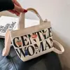 Bolso de Lona Pequeño Estampado Casual para Mujer Bolso de Comercio Exterior Nuevo Moda Transfronteriza Portátil Cubo Mini Bolso de Hombro Cruzado para Mujer