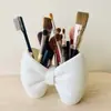 Portacepillos de dientes con forma de arco, estante para cepillos de dientes y pasta de dientes para tocador de baño, soporte creativo para almacenar cepillos de dientes, base para organizar artículos