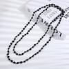 Collar largo de concha negra multicapa moderno y moderno de nicho retro europeo y americano, cadena de suéter versátil de otoño e invierno de Yiwu, joyería