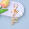 Nuevo Colgante de Llave con Letra de Pegamento Gotas Doradas Llavero Colgante para Bolso de Niña DIY Regalo para Novia Venta Caliente Transfronteriza