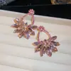 Nuevos aretes de plata con diseño de flor hueca en forma de abanico incrustada de diamantes, lujo ligero y sensación de alta gama, diseño de nicho, aretes de moda
