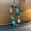 Cadena para Teléfono Móvil Luna Pequeña Rosa Azul Nuevo Cordón para Teléfono Móvil Colgante Corto Estilo Ins Cadena Colgante para Cámara Ccd de Mujer Nuevo Estilo