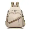Mochila Versátil Simples da Moda para Mulheres 2025 Nova Casual Estudante Bolsa Escolar Grande Capacidade Multicamadas Bolsa de Ombro para o Dia a Dia
