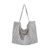 Bolso de lona a rayas estilo japonés nuevo para mujer, gran capacidad, bolso de hombro estilo casual, bolsa de compras simple y artística