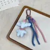 Estilo Coreano Nuevo Tela Rellena de Algodón Gato y Conejo de Dibujos Animados Llavero Delantal de Moda Conejo Broche Colgante Accesorio Versátil para Bolso