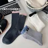 Calcetines Suaves y Acogedores de Lana para Mujer, Otoño e Invierno Espesos Cálidos Calcetines de Media Pantorrilla con Lazo Bloque de Color, Calcetines Arrugados con Etiqueta de Tela Blanca Estilo Japonés