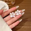 Brincos de Zircônia Branca Flor Freesia Flash para Mulheres, Delicados, Modernos e Versáteis, Brincos de Celebridade da Internet, Estilo Coreano, Novos Brincos Elegantes