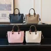 Bolso de mano elegante y versátil para mujer, nuevo diseño moderno 2026, adecuado para ir al trabajo, se puede llevar en la mano o usar como bolso de hombro o bolso cruzado