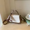 Bolso pequeño transfronterizo 2026 nuevo super popular para mujer, bolso de hombro de alta gama, bolso cruzado cuadrado pequeño