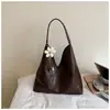 Bolsa tote de grande capacidade para mulheres, nova versão coreana outono 2026, estilo minimalista, cor sólida, artística, casual, bolsa de ombro vintage