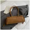 Bolsa de Mão Retrô da Moda para Mulheres 2026 Nova Bolsa de Ombro Versátil para Outono e Inverno Bolsa Transversal Simples para o Dia a Dia