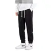 Pantalones deportivos casuales de pana transfronterizos para hombre, pantalones jogger de invierno, pantalones de chándal engrosados con forro polar de otoño e invierno para hombre