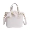 Bolso pequeño súper popular para mujer, nuevo bolso de hombro acolchado de moda primavera-verano 2026, bolso cruzado tipo cubo para el día a día