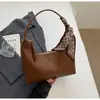 Bolsa de Ombro Versátil Tendência Feminina Estilo Coreano Simples e de Alta Qualidade Nova Moda Primavera 2026 para Estudante Universitário e Comutador