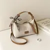 Bolsa de axila texturizada em camurça retrô para mulheres, nova coleção 2026, bolsa de ombro versátil, design simples e estiloso, perfeita para o dia a dia