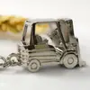 Aleación de Zinc de Fábrica Molde Estéreo 3D Forma de Montacargas Llavero Regalo Pequeño con Cadena Corona Suministros Pequeños para Coche