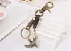 Lote Misto Direto da Fábrica Chaveiro Masculino Vintage de Couro de Vaca Liga de Zinco Águia Voadora Pingente Decorativo Pingente para Mochila de Meninas