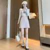 Saia de Lã Cinza para Mulheres, Nova Estilo Primavera, Outono e Inverno 2025, Cintura Alta, Emagrecedora, Petite, Forrada com Lã, Corte Evasê, Justa no Quadril, Saia Curta