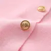 Ins estilo europeo y americano transfronterizo 2026 nueva moda elegante para ir al trabajo manga corta cuello redondo hombreras acolchadas casual chaqueta corta de punto