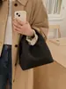 Bolsas de Nicho de Gama Alta para Mujer 2026 Nuevo Bolso de Hombro Cruzado Simple de Moda Bolso de Mano para Viaje Diario Bolso Cubo