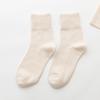 Calcetines Zhuji para mujer, venta al por mayor, calcetines de primavera y otoño, algodón absorbente de sudor, transpirables, de color sólido, medias de otoño e invierno para mujer.