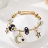 Pulsera Pan's New Simple con Colgante de Estrella de Línea Negra con Diamantes y Cuentas de Vidrio Negro, Separador de Trébol de Cuatro Hojas