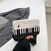 2025 Invierno Nueva Moda Contraste de Color Bolso Cuadrado Pequeño Chica Personalidad Dulce Nota de Piano Cartera Pequeña Portátil Bolso de Mujer