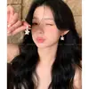 Aretes de Estrella Plateada para Mujer Modelo Nuevo 2026 Exquisitos Simples Elegantes Versátiles con un Toque de Alta Gama Lujo Ligero Accesorios para Orejas de Nicho