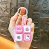 Chaveiro Divertido de Botão de Quatro Grades para Alívio do Estresse com Sensação Mecânica, Pingente de Brinquedo Portátil para Ponta do Dedo, Acessório de Bolsa Venda por Atacado