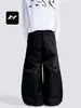Con una rica hoja occidental curva simple retro americana para hombres y mujeres pantalones de pierna ancha diseño de pliegues holgados sentido de diseño corte tridimensional