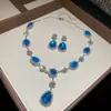 Novo Conjunto de Brinco e Colar Pingente Oval Gota d'Água Cravejado com Diamantes, Corrente de Clavícula de Nicho de Alto Padrão, Joias Luxuosas para Banquete