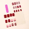 Uñas Vestibles de Navidad Borde Francés Rojo Patrón de Copo de Nieve Raya Roja y Blanca Manicura Removible Uñas Postizas
