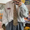 Camisa de rayas de manga larga estilo retro japonés cityboy para hombre, nueva para primavera y otoño, capa interior casual estilo Hong Kong, top elegante y genial